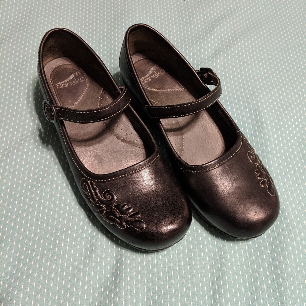 Dansko black clog pumps